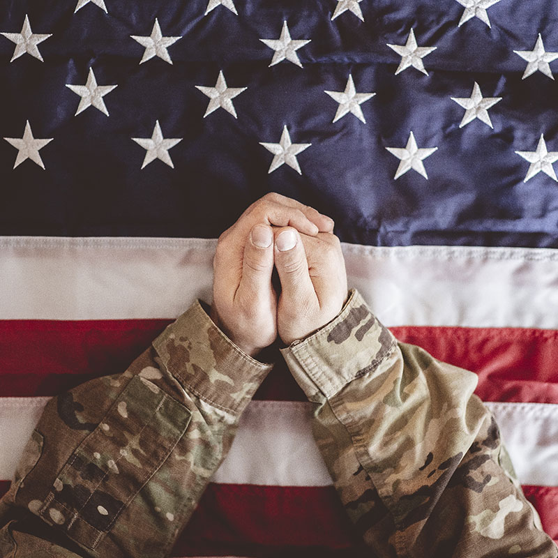 Veteran with flag